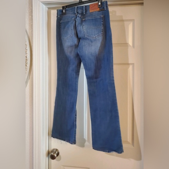 Lucky Brand ladies wide leg jeans are a size 4/27. - Picture 2 of 10